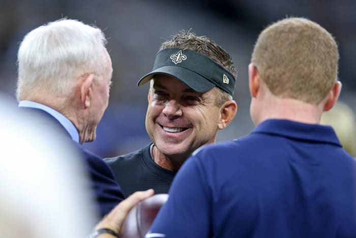 Sean Payton talking with Jason Garrett and Jerry Jones of the Cowboys